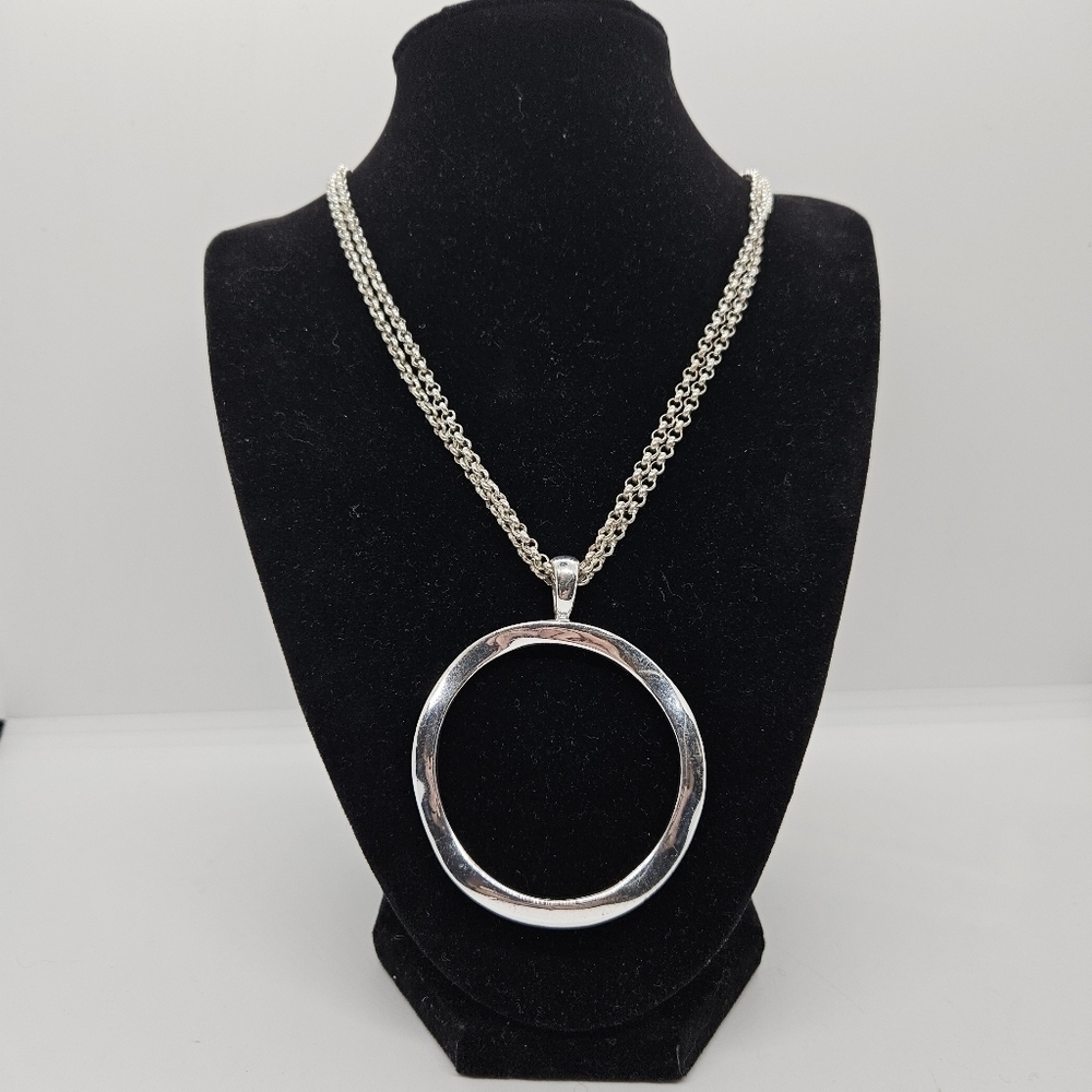silver tone two chain necklace with large open circle pendant